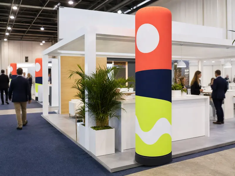 Coral inflatable column on a trade show booth
